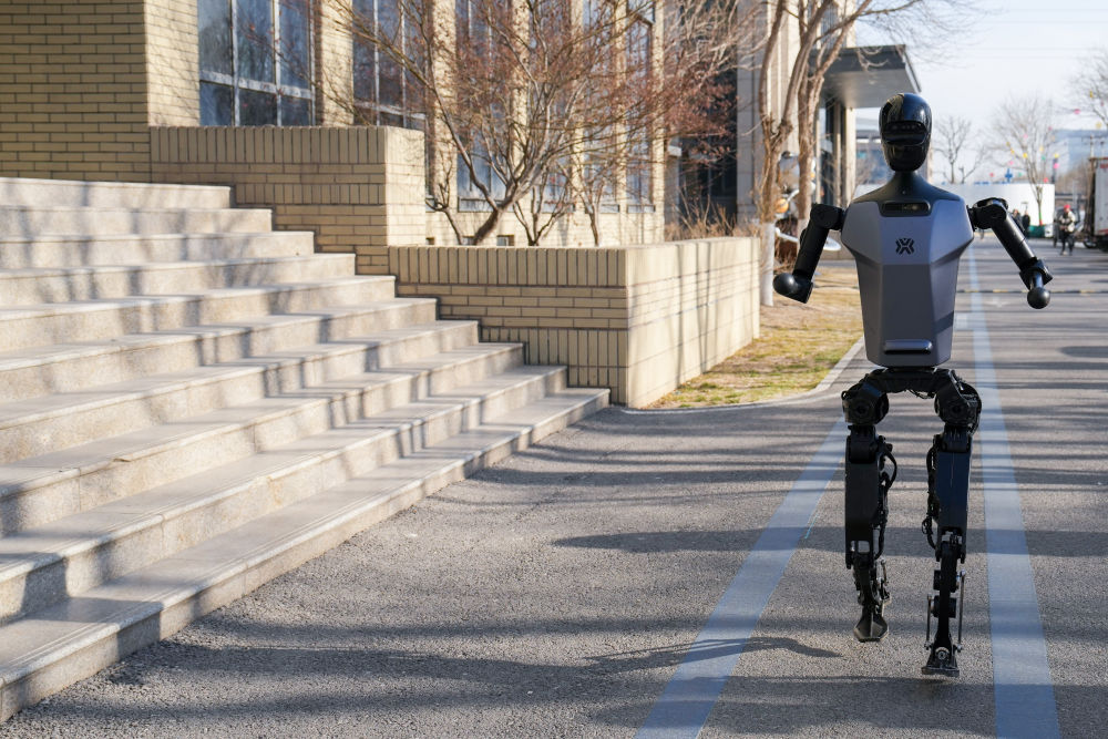 Humanoid robot "Tiangong," developed by the National-Local Joint Embodied Intelligence Robotics Innovation Center, demonstrates its running capabilities at the Beijing Robotics Industrial Park (E-Town) on February 24.