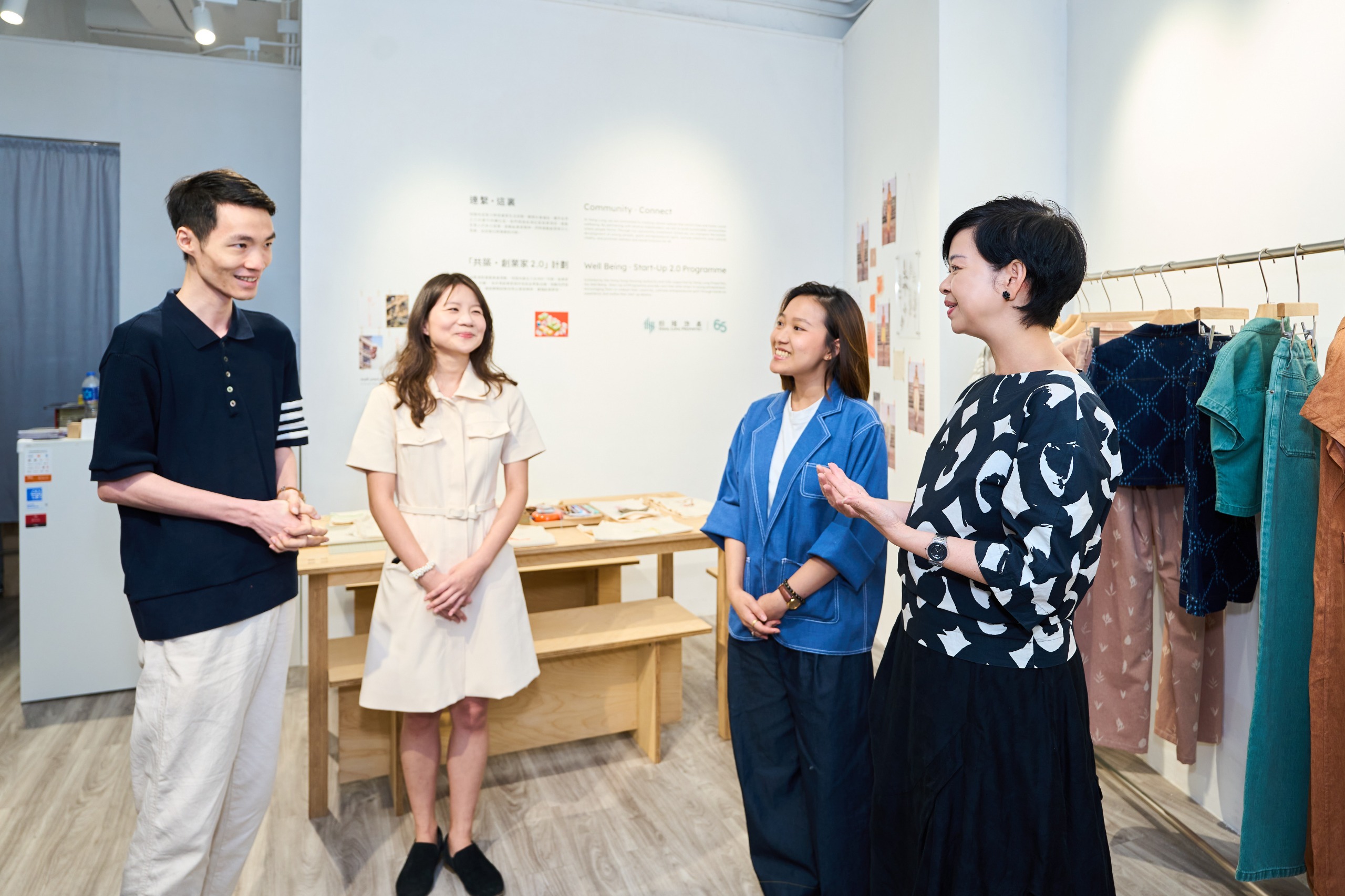 The three winning entrepreneurs sharing their entrepreneurial journey with the Secretary for Housing, Ms. Winnie Ho Wing-yin (first from the right)