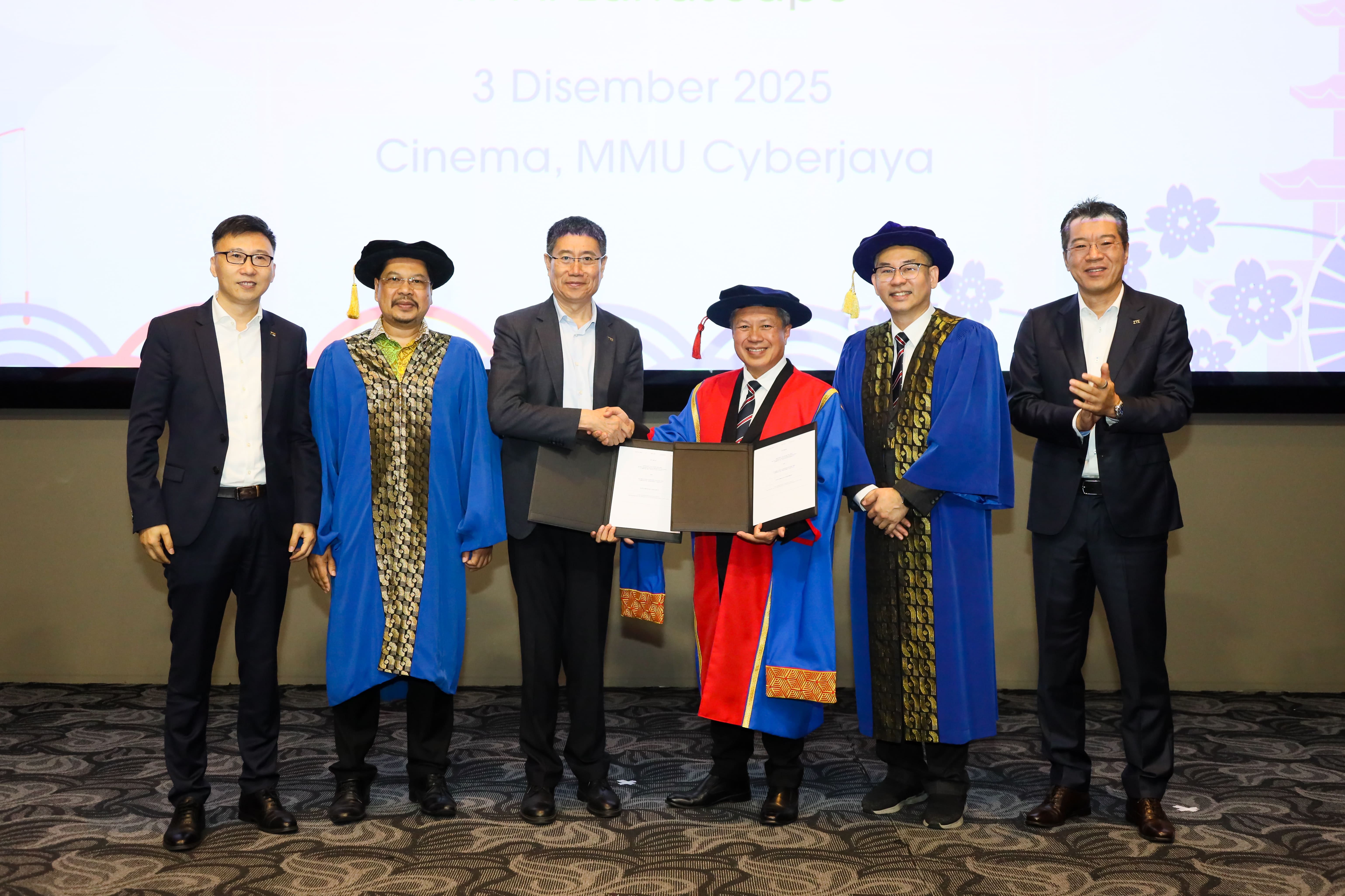 From left to right: Dr. Li Ming, Vice President, ZTE Corporation, and President of the ZTE Global Learning & Development Centre; Tuan Yusri bin Razalli @ Ghazalli, Senior Deputy Director, Human Capital Development Division, JPA; Mr. Gu Junying, Senior Vice President, ZTE Corporation; Professor Dato' Dr. Mazliham Mohd Su'ud, President and CEO, MMU; Prof. Ir. Dr. Wong Hin Yong, Vice President, Academic and Innovative Learning, MMU; and Mr. Steven Ge, Managing Director, ZTE (Malaysia) Corporation Sdn. Bhd., during the exchange of the ZTE–MMU AI Strategic Collaboration Addendum.