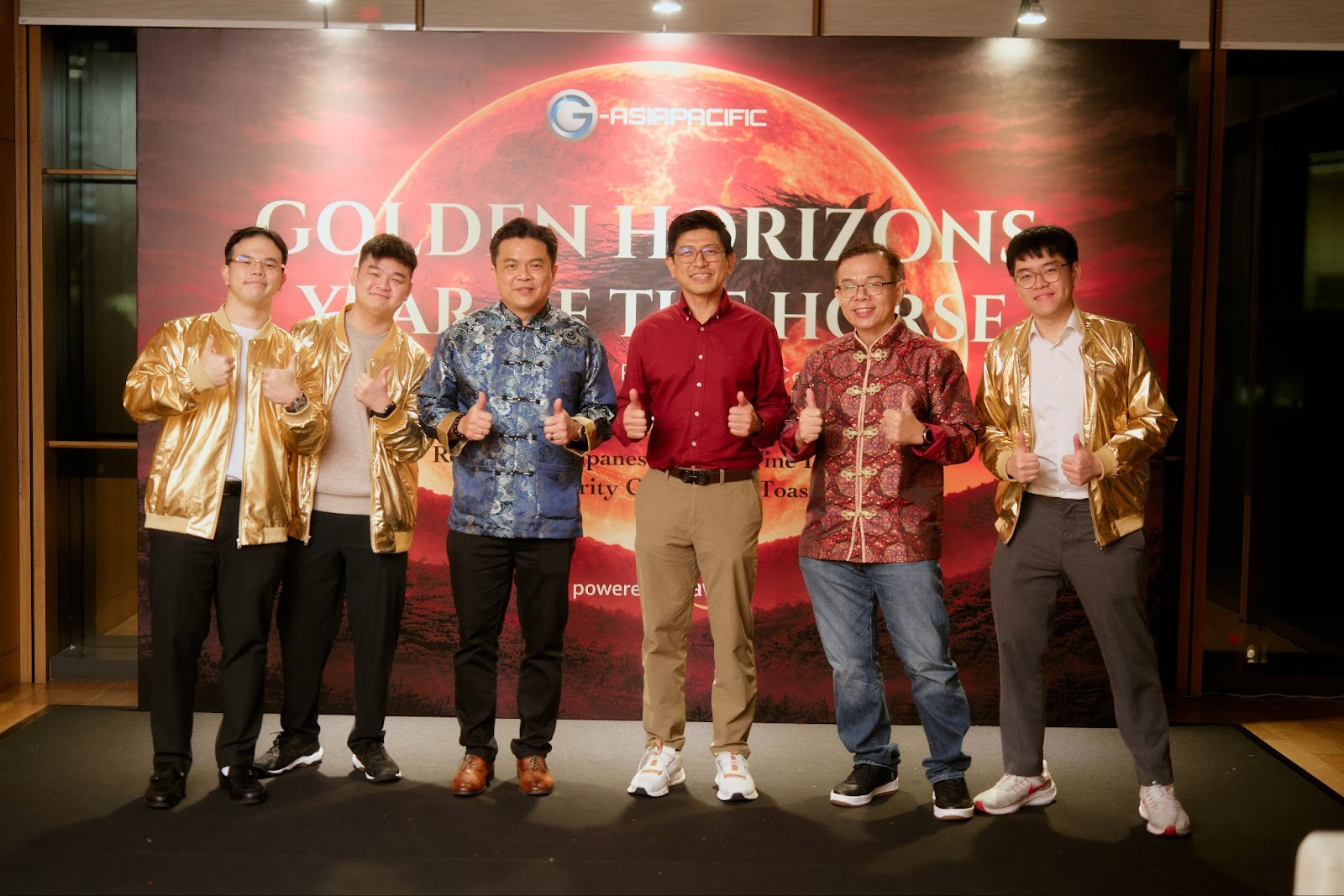 Mark Goh, CEO of G-AsiaPacific; Hussein Mohd Ali, Country Manager of AWS Malaysia; Gordon Chen, CTO of G-AsiaPacific; with three G-AsiaPacific employees who achieved the prestigious AWS Golden Jacket.