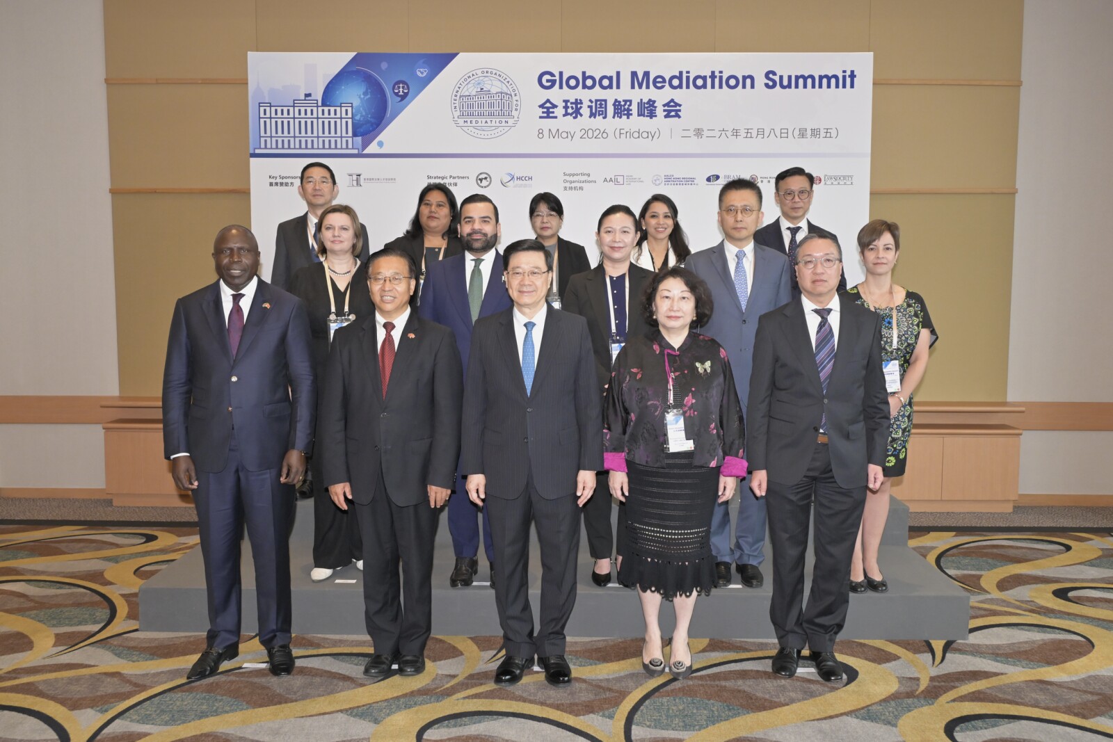 HKSAR's Chief Executive, John Lee (first row, centre), attends the Global Mediation Summit today (May 8), joined by the Commissioner of the Ministry of Foreign Affairs of the People's Republic of China in the HKSAR, Cui Jianchun (first row, second left); the Secretary for Justice, Paul Lam (first row, far right); the Secretary-General of the IOMed, Professor Teresa Cheng (first row, second right), along with other guests.