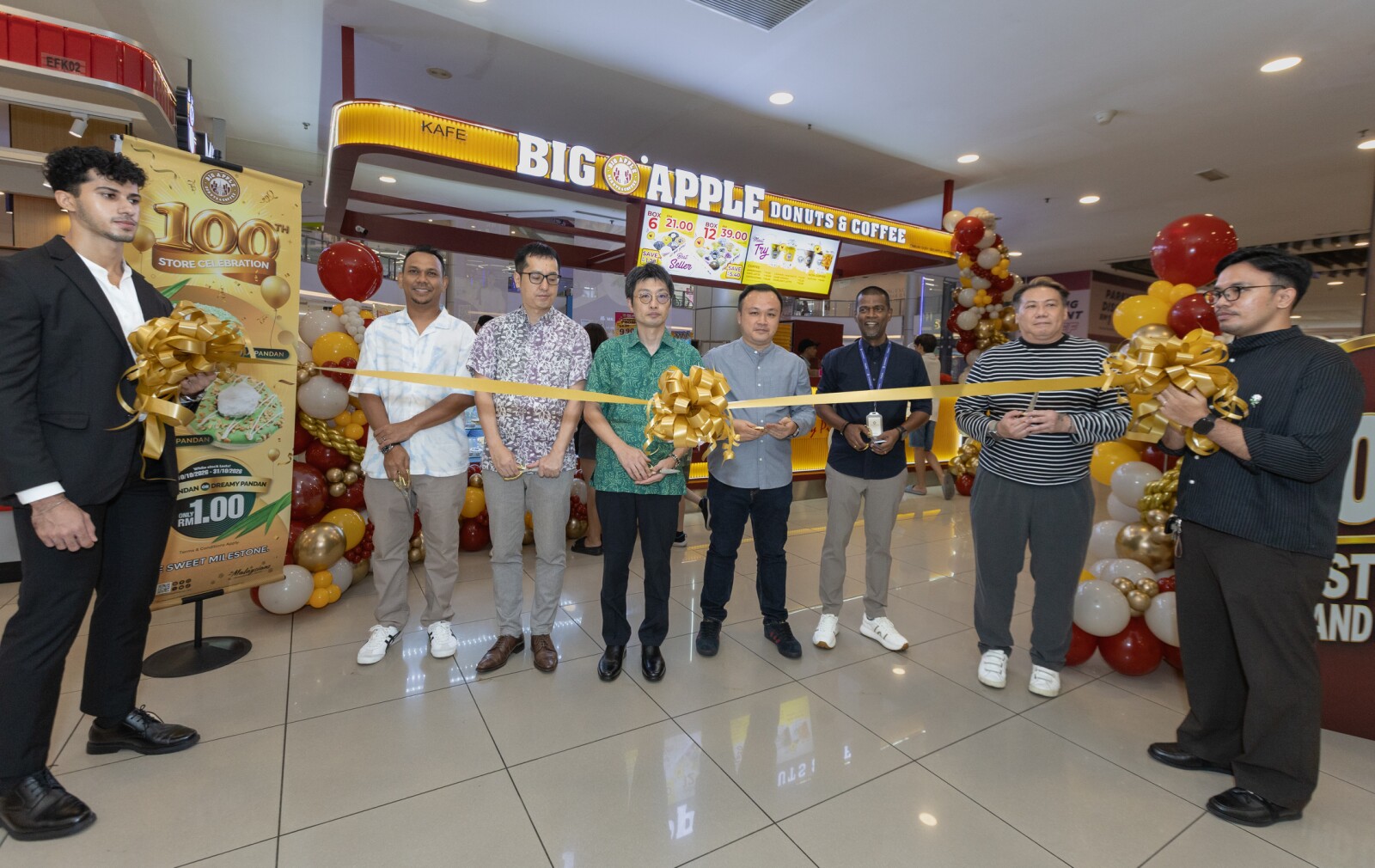 Left to right: Mr. Mohammad Fadzli B. Zainurdin, General Manager, Big Apple Donuts & Coffee; Mr. Takashi Horii, Chief Financial Officer, Big Apple Donuts & Coffee; Mr. Yasuo Mizoguchi, Managing Director, Big Apple Donuts & Coffee; Mr. Ron Poon, Director, Big Apple Donuts & Coffee; Mr. Nilamegan, Operations Manager, IOI Mall Puchong; and Mr. Edward Yong, Senior Manager, FO Design, at the opening of Big Apple Donuts & Coffee's 100th store in Malaysia at IOI Mall Puchong on 10 October 2026.